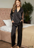 Pijama bohemio de satén Corinne en negro.